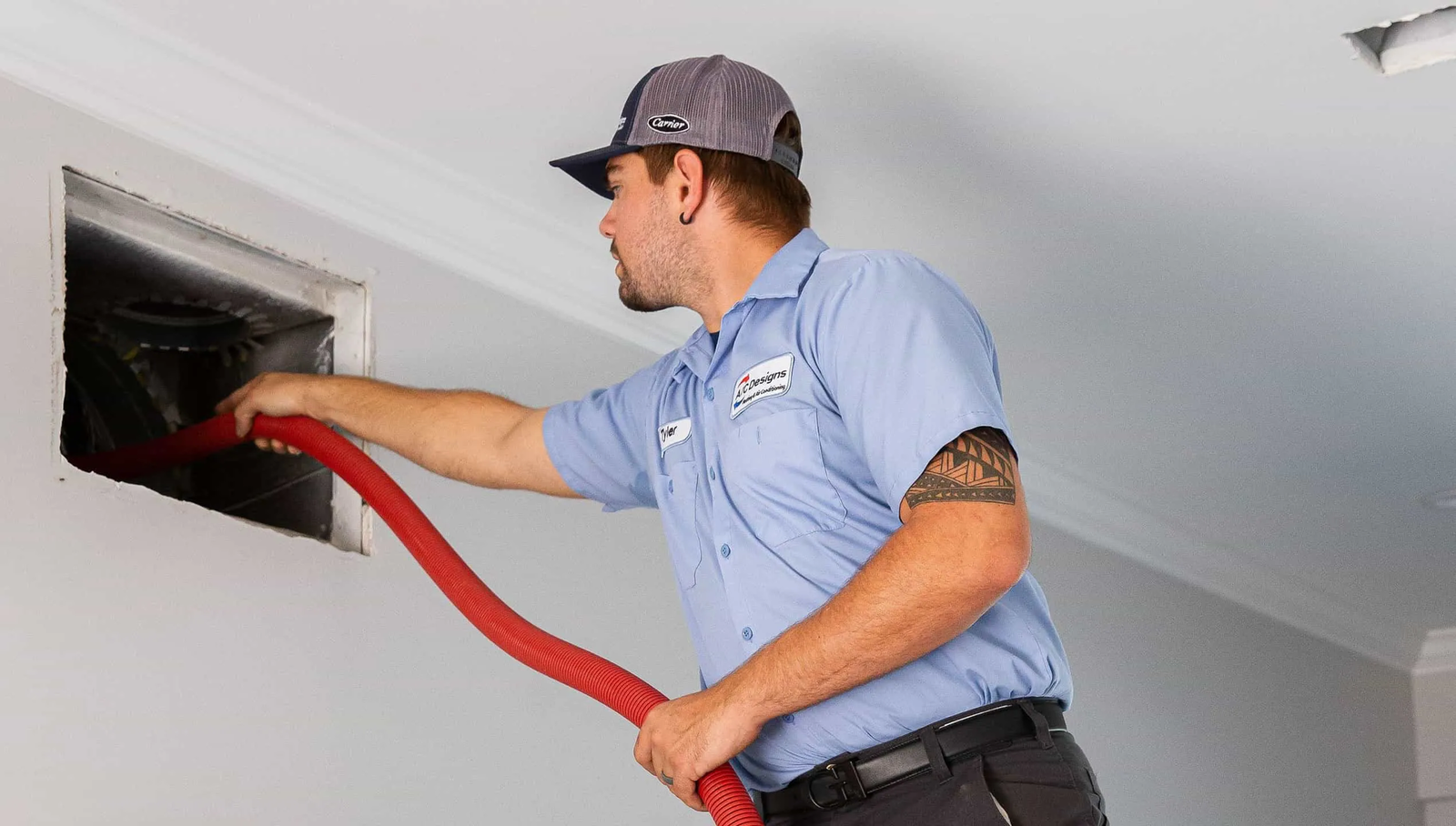 HVAC technician testing air conditioning and duct system performance
